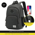Grey and black USB charging backpack with trolley sleeve on luggage