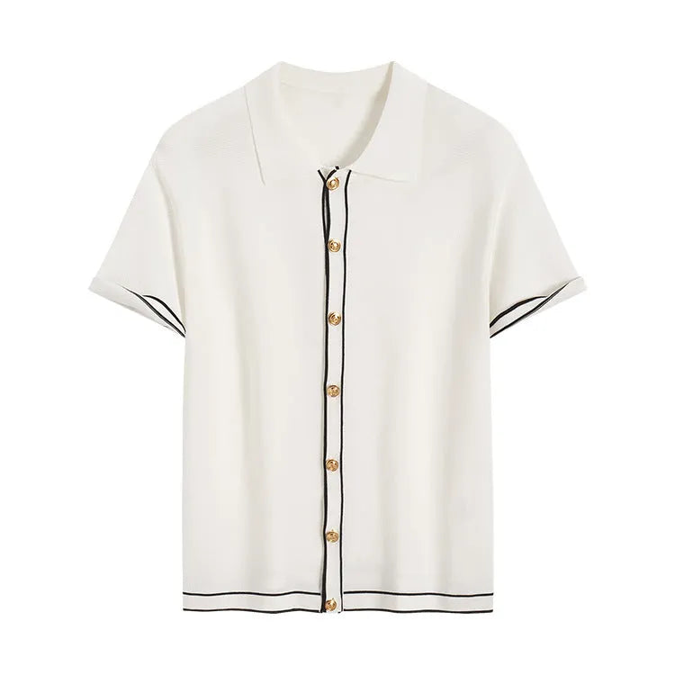 White short sleeve cardigan with contrasting lapels on a hanger