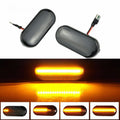 Skoda Octavia flowing water style side turn signal indicator light in blackened ABS plastic housing
