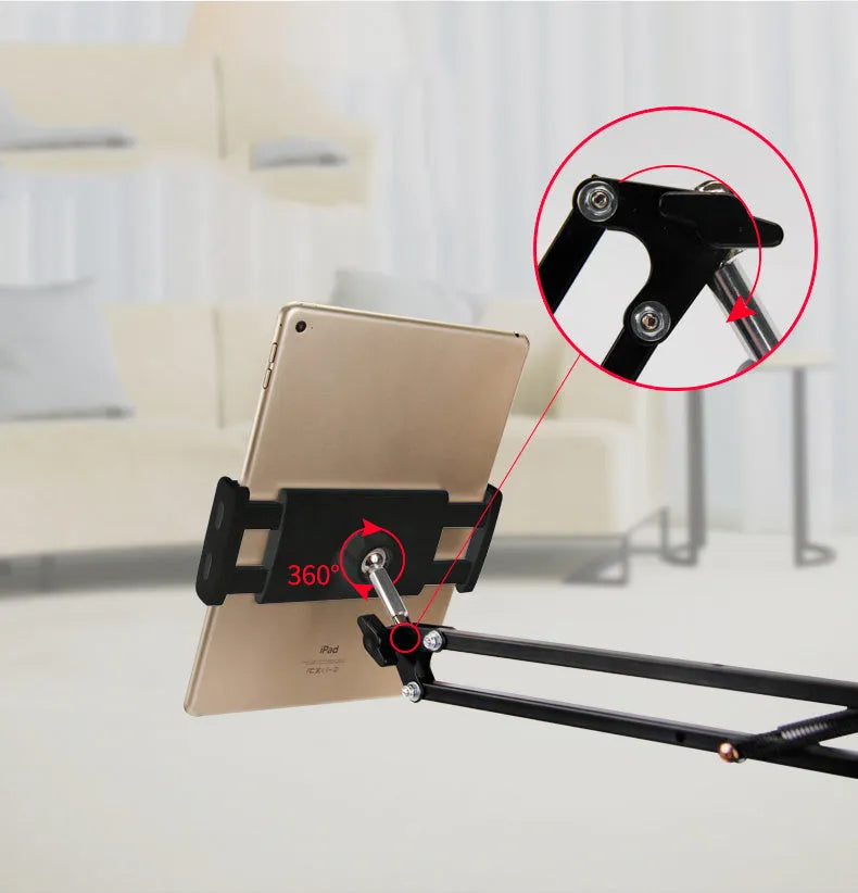 Adjustable phone and tablet stand in black and white colours on desktop