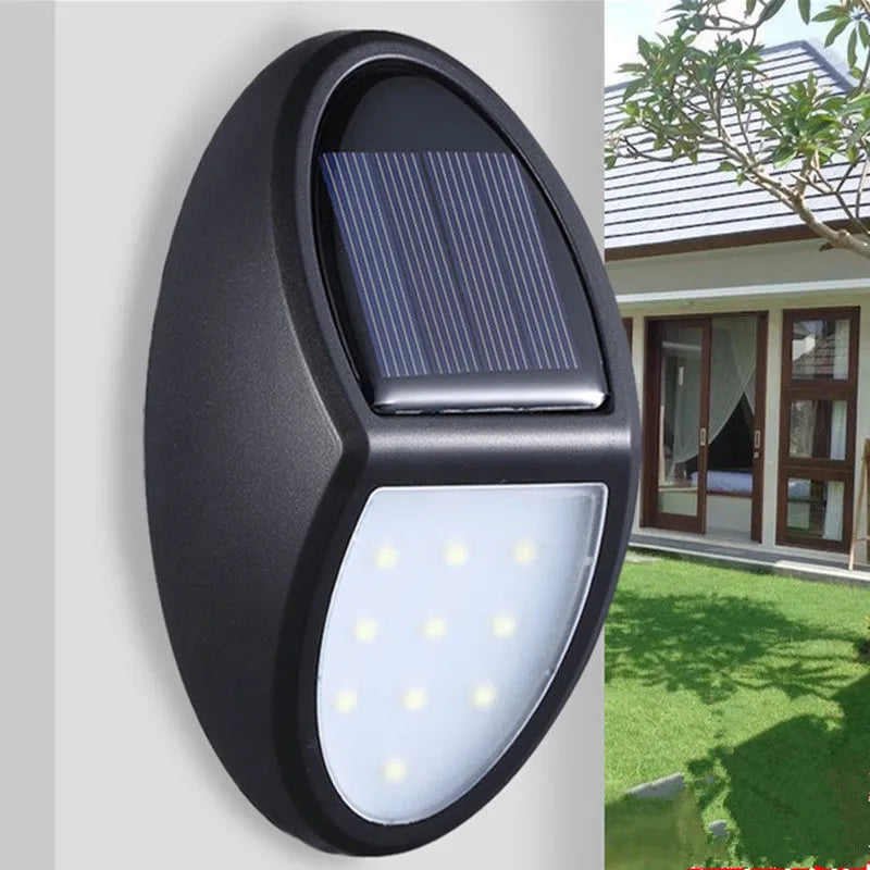 Black solar wall light with solar panel showing dimensions 75mm x 120mm
