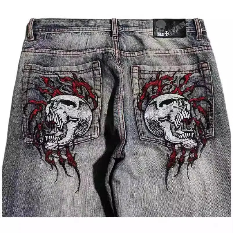 Men's grey washed-out straight-leg jeans with wide-leg workwear design.