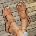 Roman-style slippers with a slope heel and fish mouth toe design in PU leather, shown in beige colour.