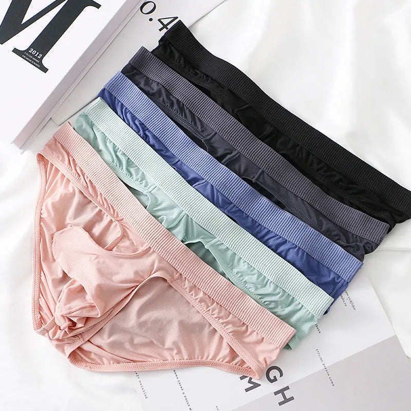 Men's black low-waist Ice Silk briefs laid flat, showing knitted nylon fabric and briefs cut.