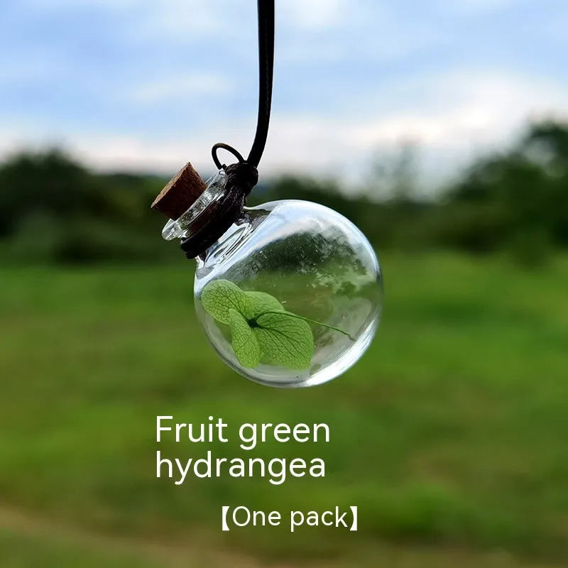 Glass car perfume pendant with preserved flowers in selected colour and diameter