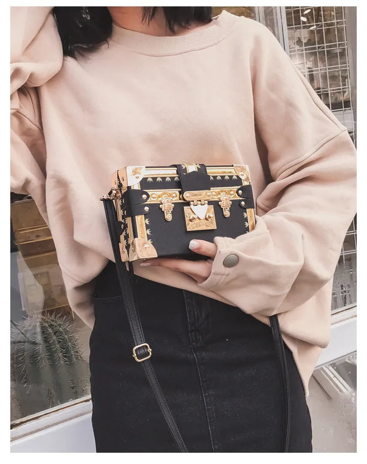 Hard structured PU leather women's shoulder bag with rivet decoration and hasp closure flap