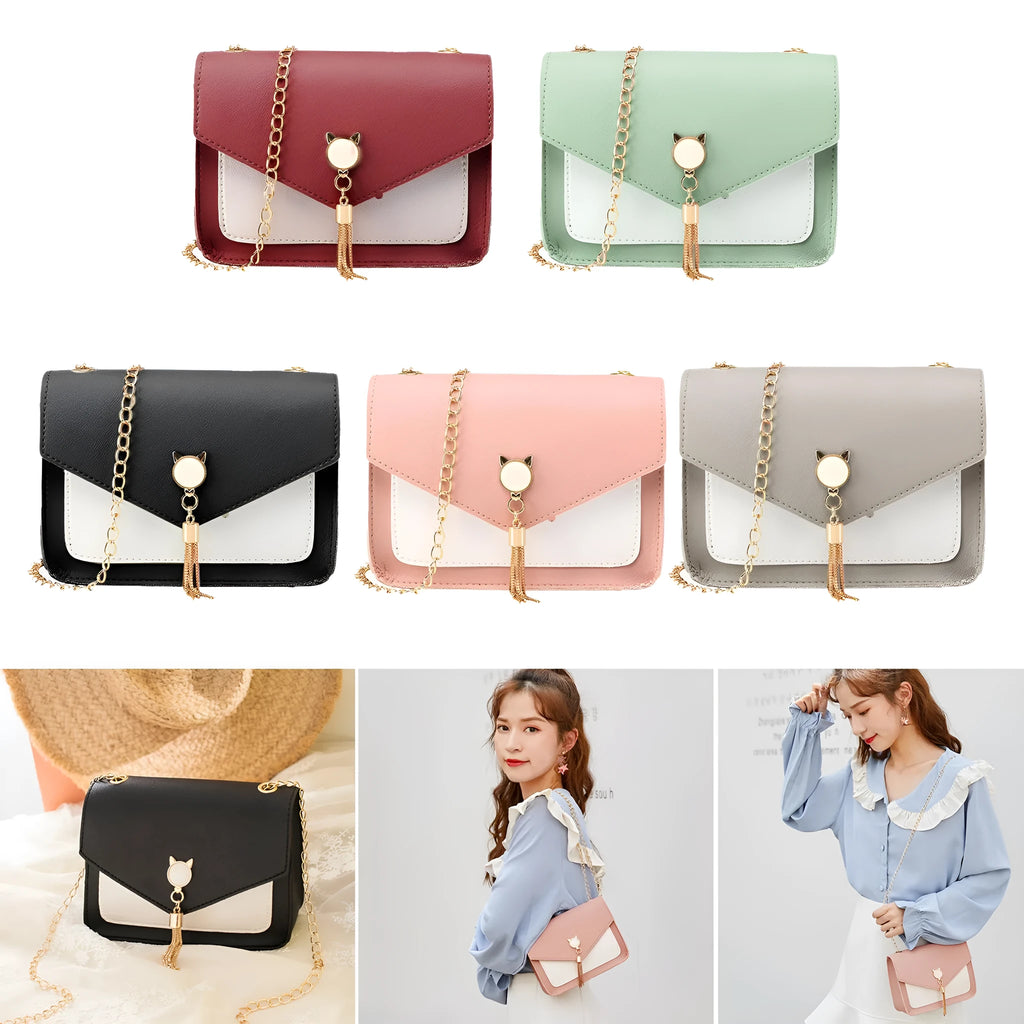 Small square PU leather crossbody bag with cat tassel decoration, magnetic flap, and adjustable chain strap in black