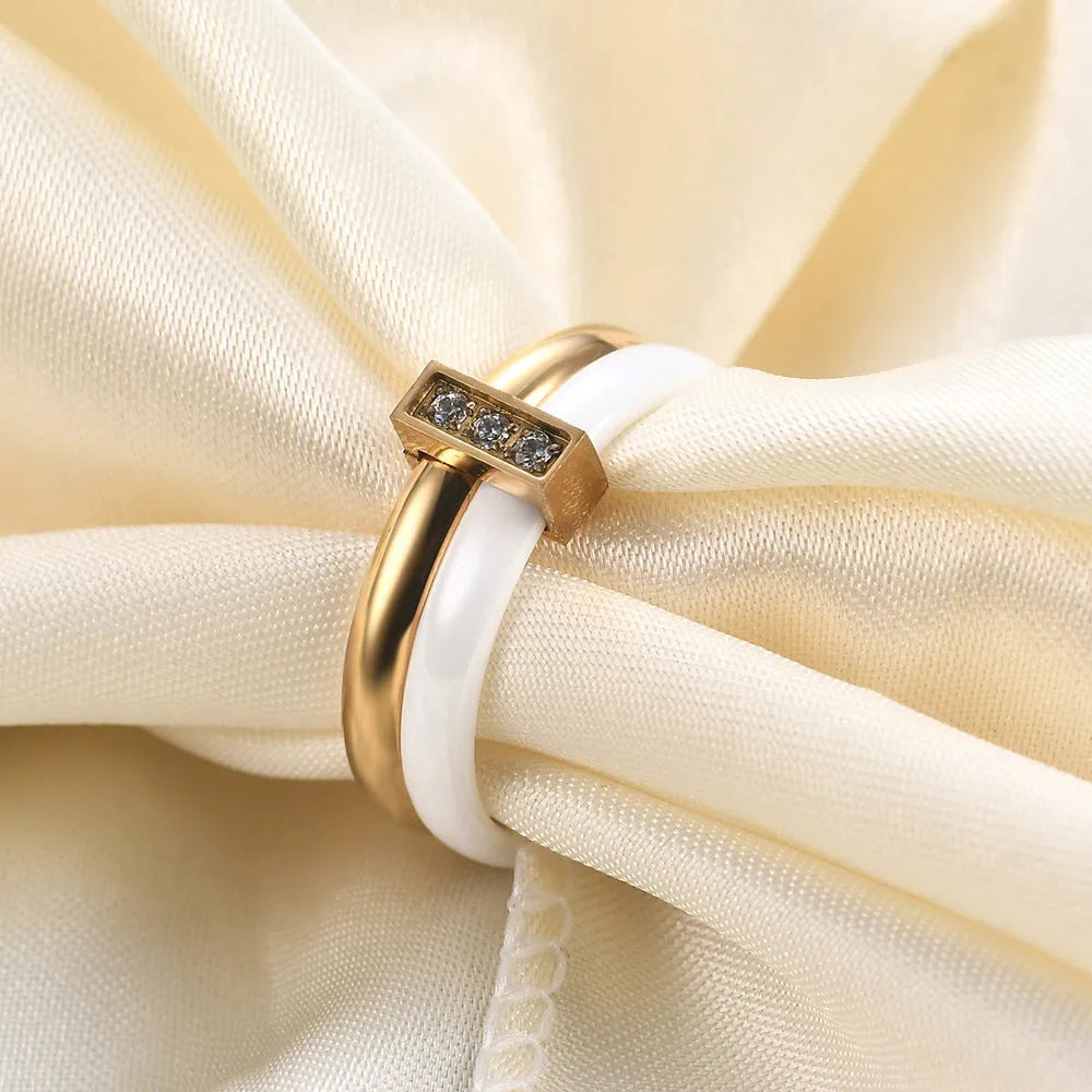 Geometric ceramic women's ring with a round 6mm zirconia stone in steel black colour.