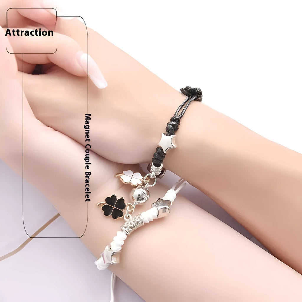 Magnetic couple's alloy bracelet pair with electroplated finish in various designs like crown, cross, and kitten.
