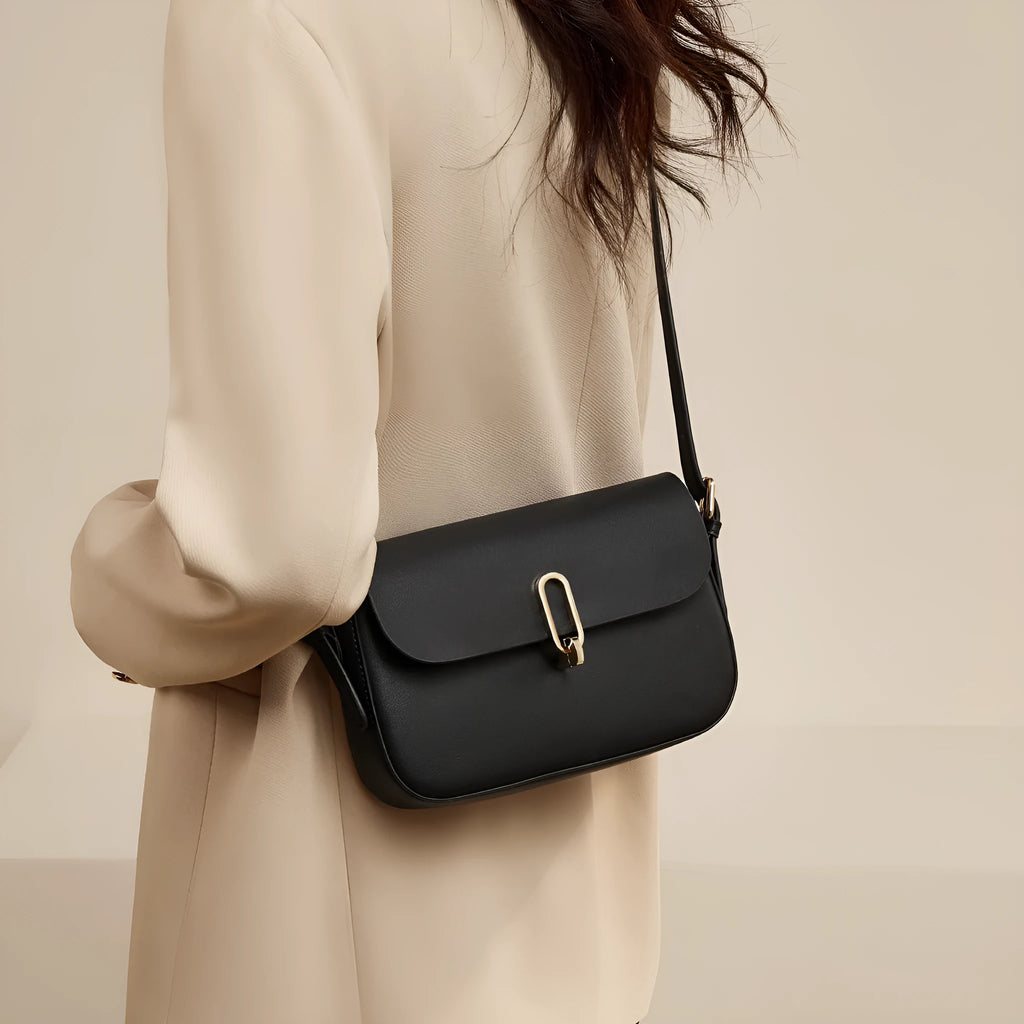 Square shoulder messenger bag in genuine cowhide leather with front lock and organised interior