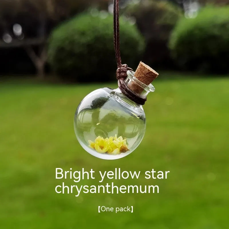 Glass car perfume pendant with preserved flowers in selected colour and diameter