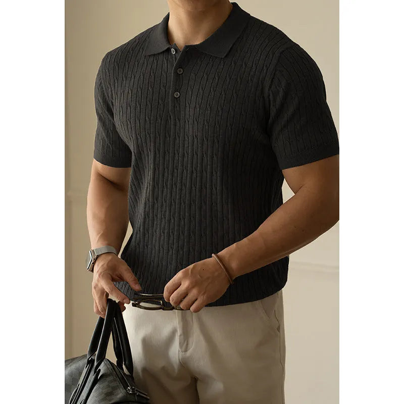 Men's khaki short sleeve business top laid flat, showing collar and button detail.