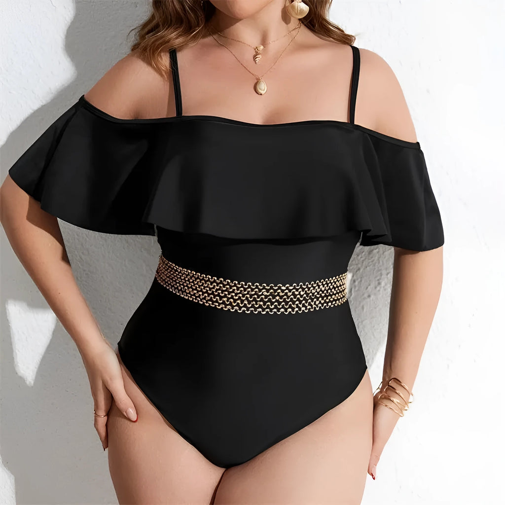 Black solid colour women's one-piece polyester swimsuit on a hanger.