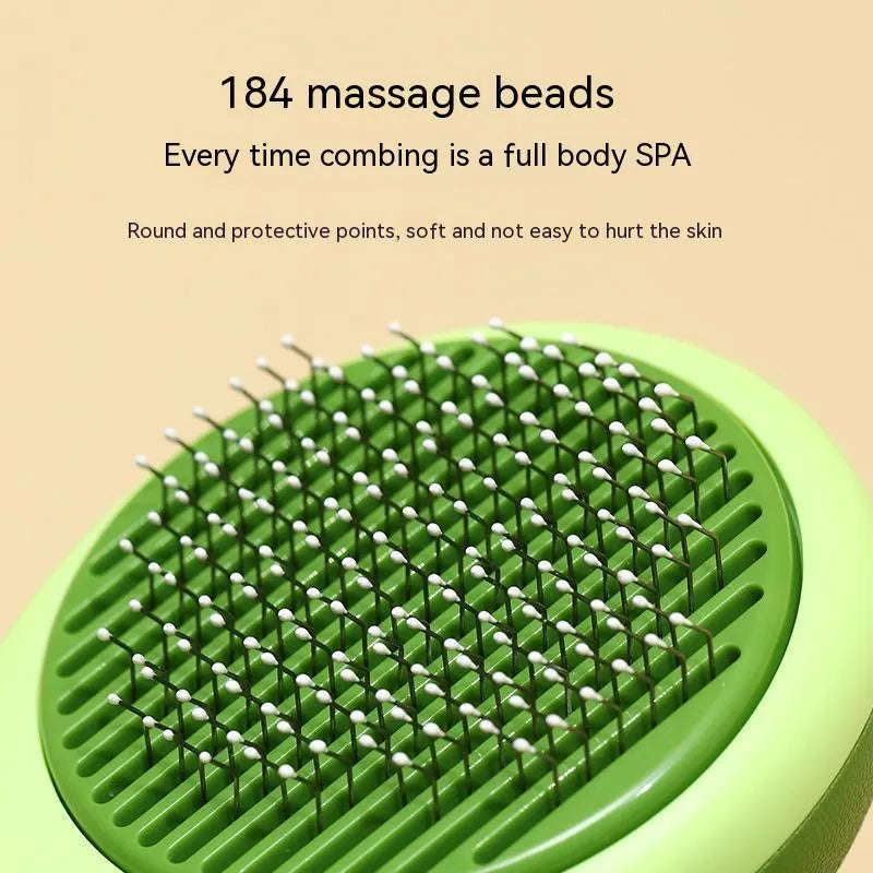 Avocado-shaped cat brush in avocado green with stainless steel needles
