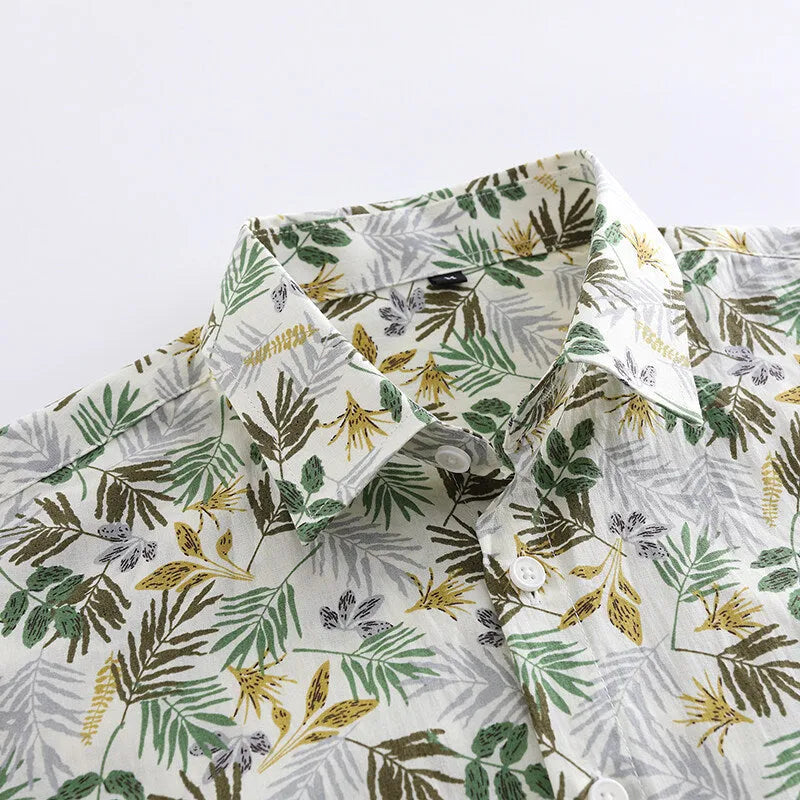 Men's floral printed cotton Hawaiian shirt in a casual cardigan style on a hanger.