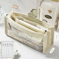 Transparent non-woven fabric school pen bag showing it can hold many coloured pens