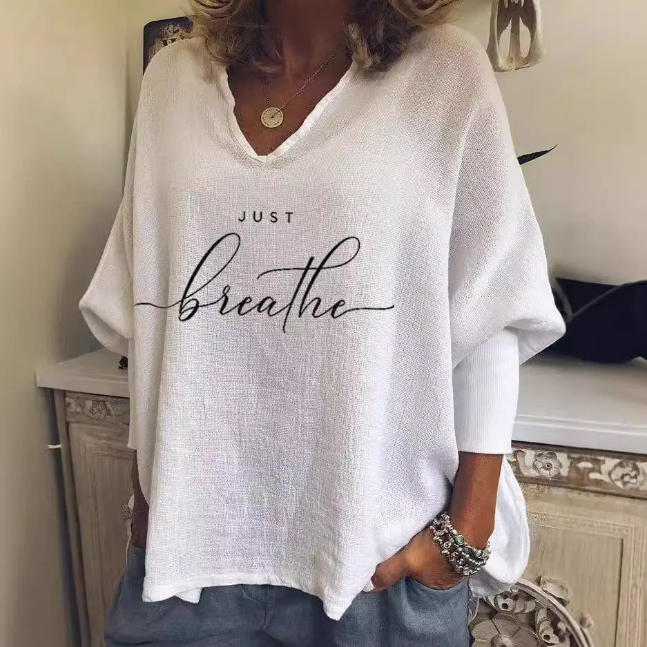 Women's loose fit V-neck long sleeve top in brushed milk silk fabric with digital print design.