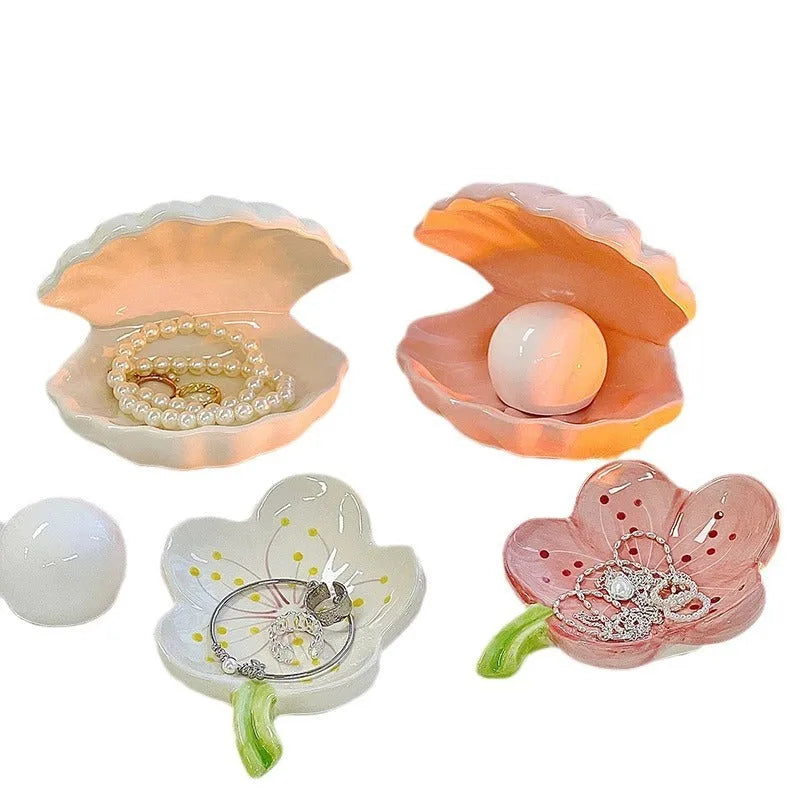 Yellow porcelain tray with a choice of pink or white decorative shell, some versions include a small integrated night light.