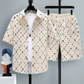 Men's casual sports shorts two-piece set in polyester, showing short sleeve top and elasticated shorts.