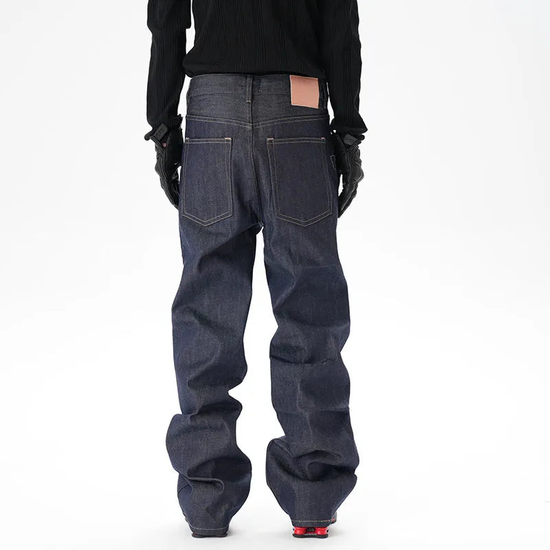 A pair of dark blue casual loose straight-cut jeans on a plain background.