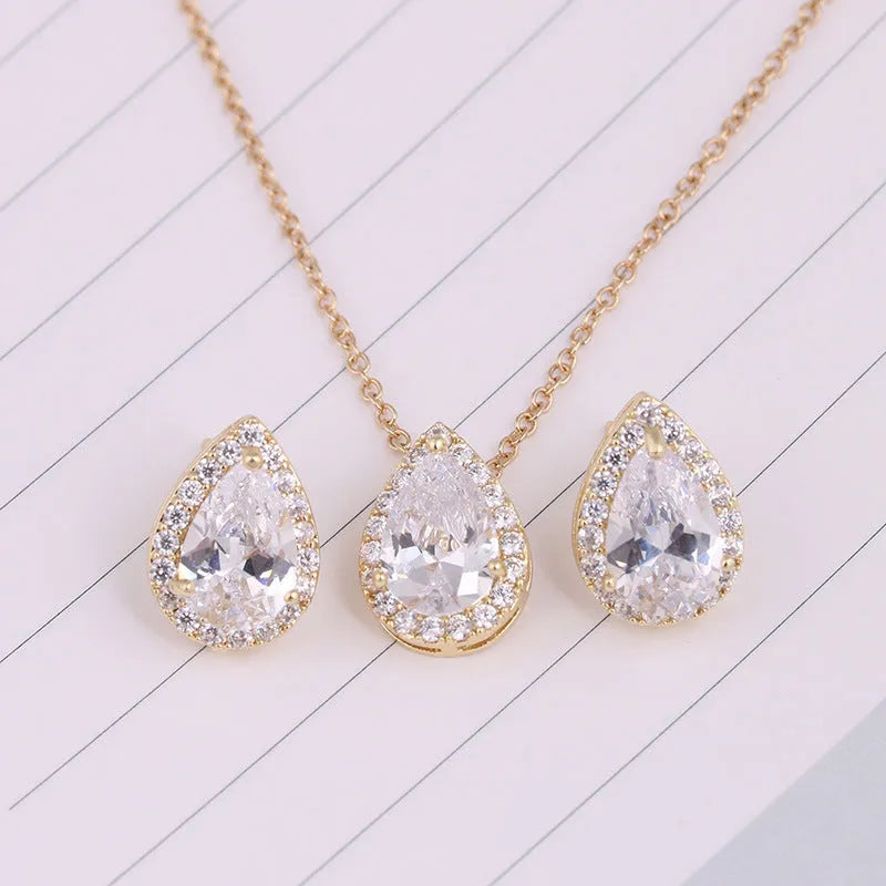 Women's water drop gemstone necklace and earrings jewellery set in copper and zircon, available in gold finish