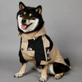 Khaki coloured polyester dog shell jacket shown on mannequin, back and side coverage design