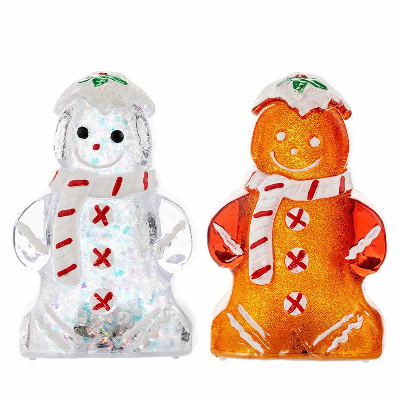 Glowing plastic Christmas ornaments with gingerbread man and snowman designs featuring red, white, and transparent scarves