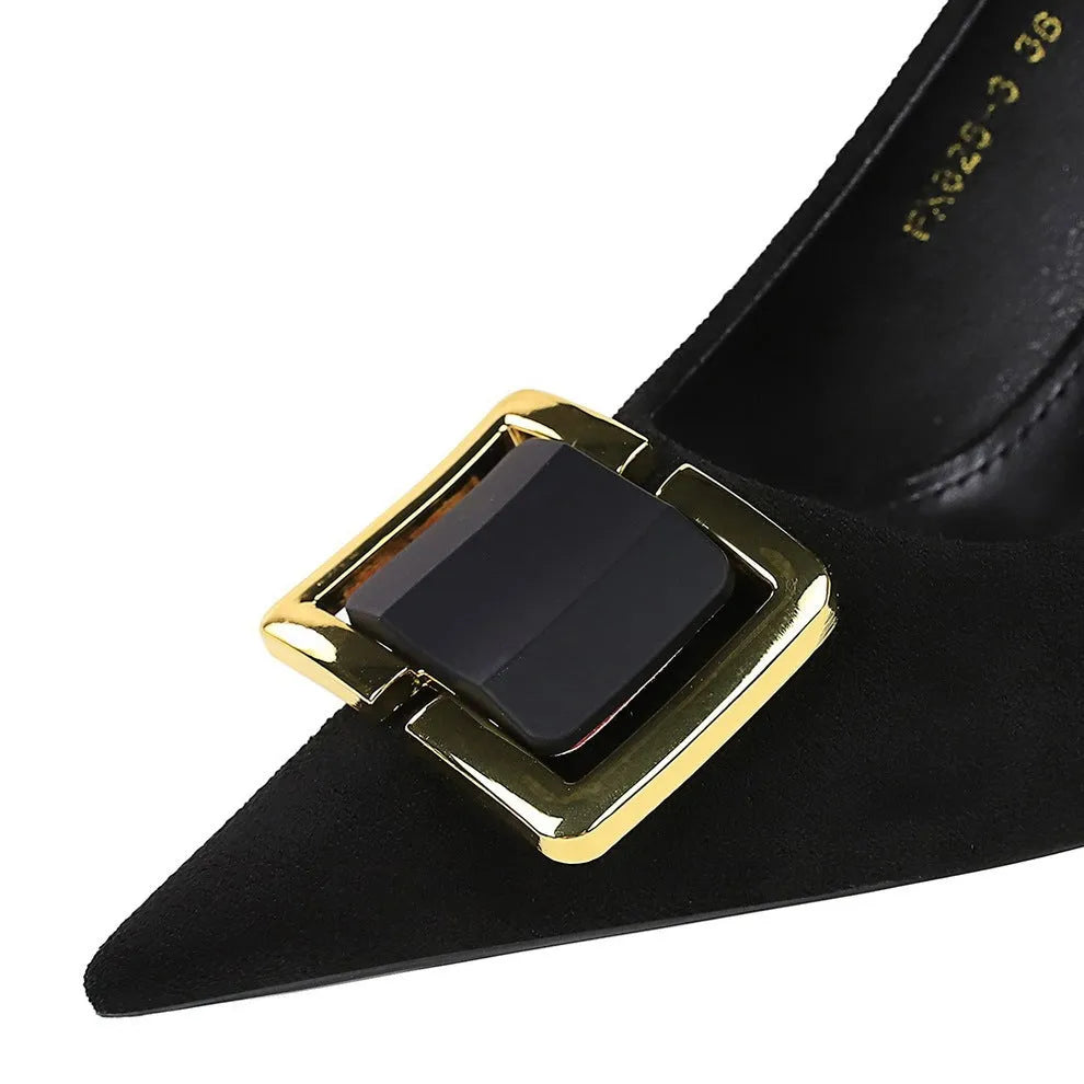 Black suede women's stiletto high heels with a 9cm heel and pointed toe on a rubber sole.