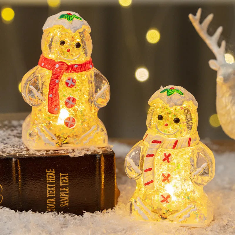 Glowing plastic Christmas ornaments with gingerbread man and snowman designs featuring red, white, and transparent scarves