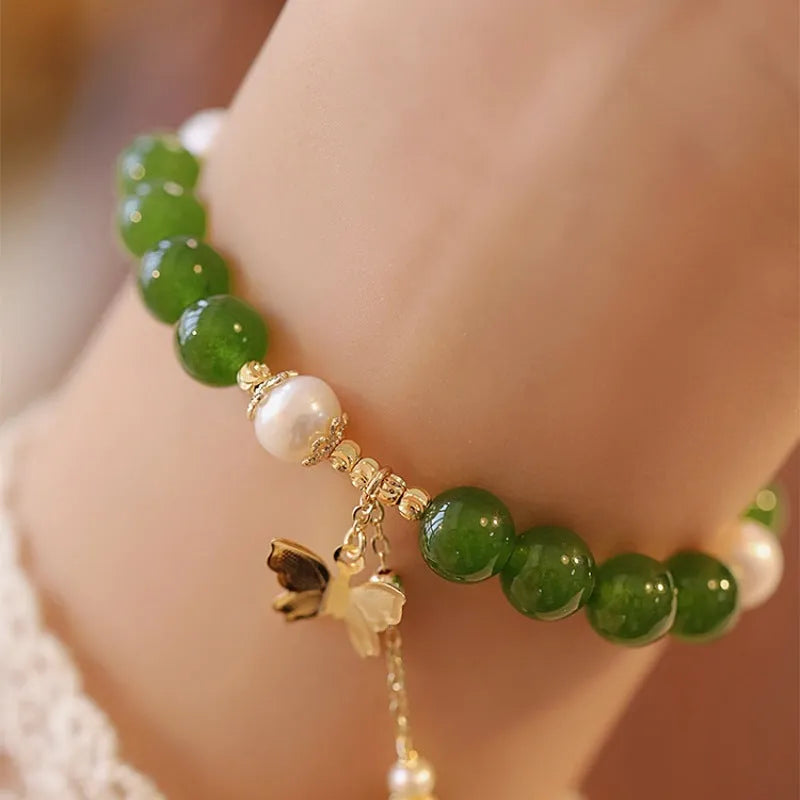 Green chalcedony bracelet with geometric shaping and round decorative elements