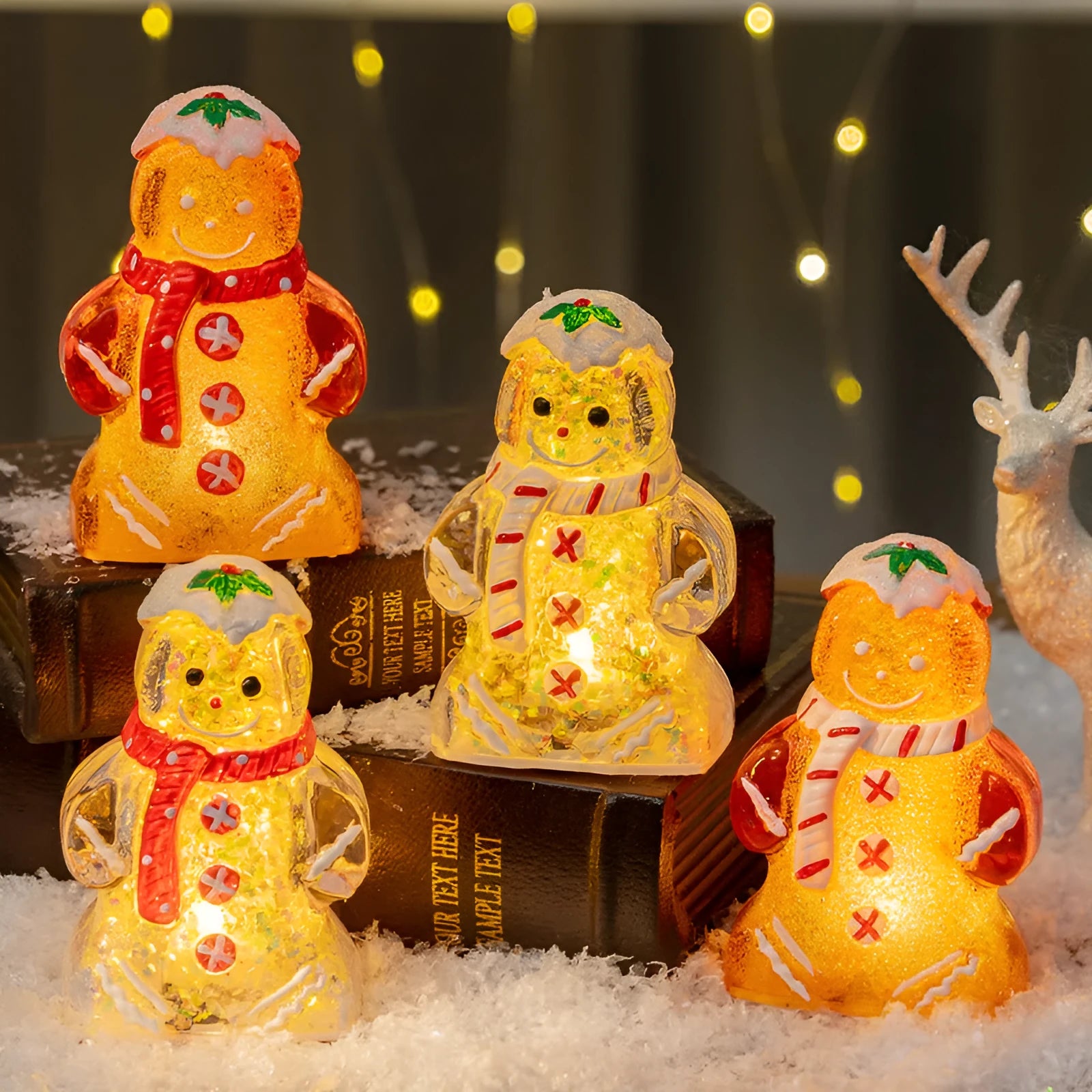 Glowing plastic Christmas ornaments with gingerbread man and snowman designs featuring red, white, and transparent scarves