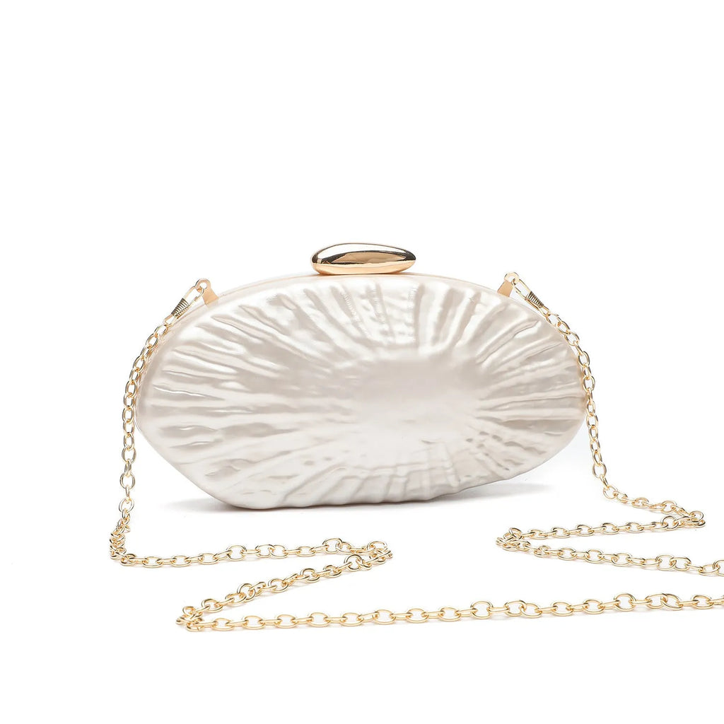 Retro oval one-shoulder crossbody bag in shell colour with hard acrylic shell and slit pocket