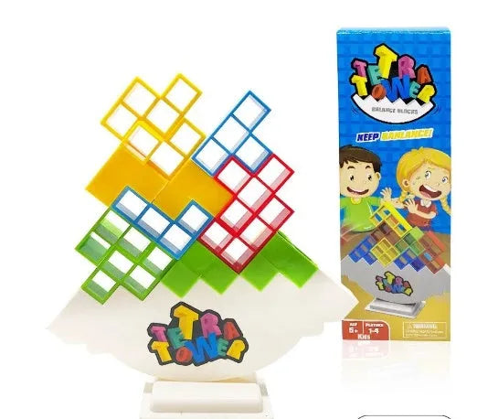 Plastic balance stacking board game with 16 colourful blocks, chassis, and base on a table.