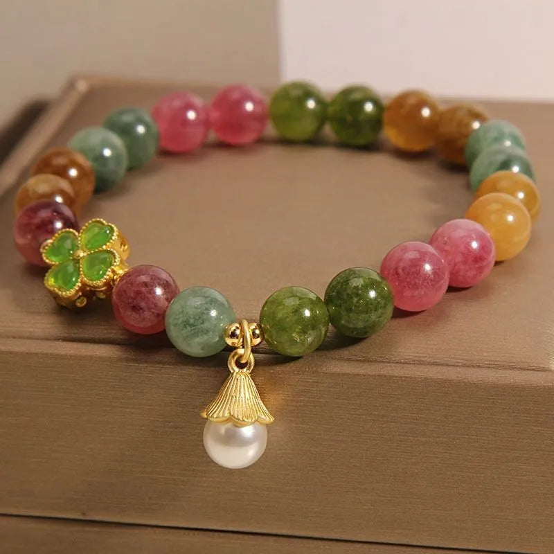 Women's tourmaline bracelet with four-leaf clover pearl pendant and geometric drop-shaped elements