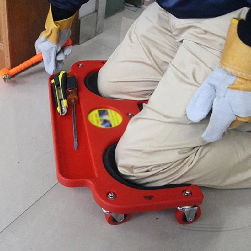 Car repair knee board with universal wheels in blue plastic for household use.