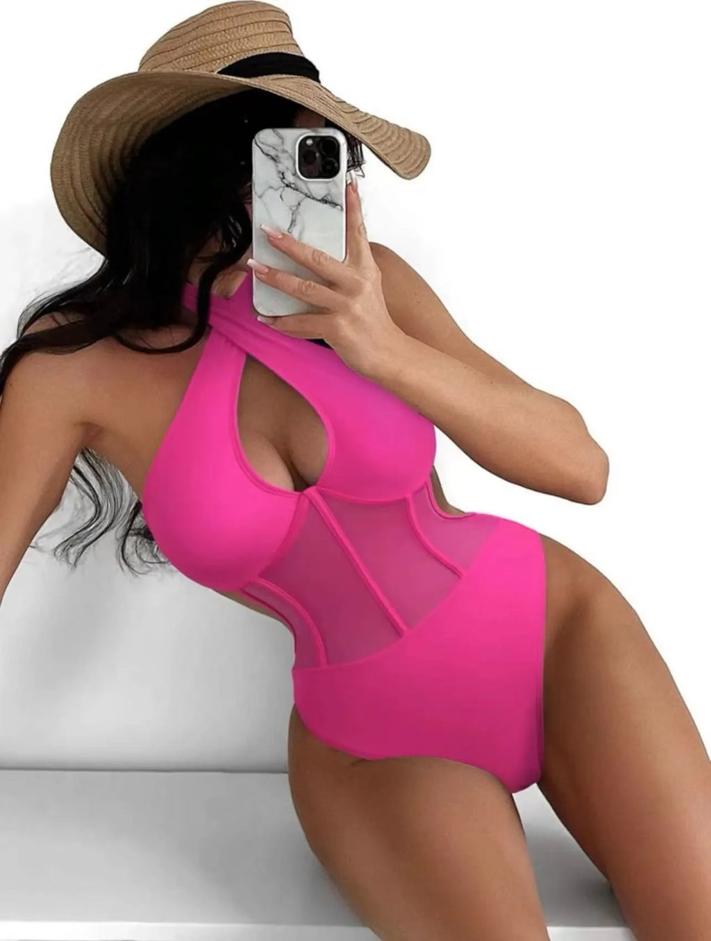 Women's black one-piece swimsuit made from nylon and spandex fabric on a mannequin.