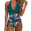 Women's printed bikini swimsuit with a lace-up front and backless gathered design in a floral pattern.