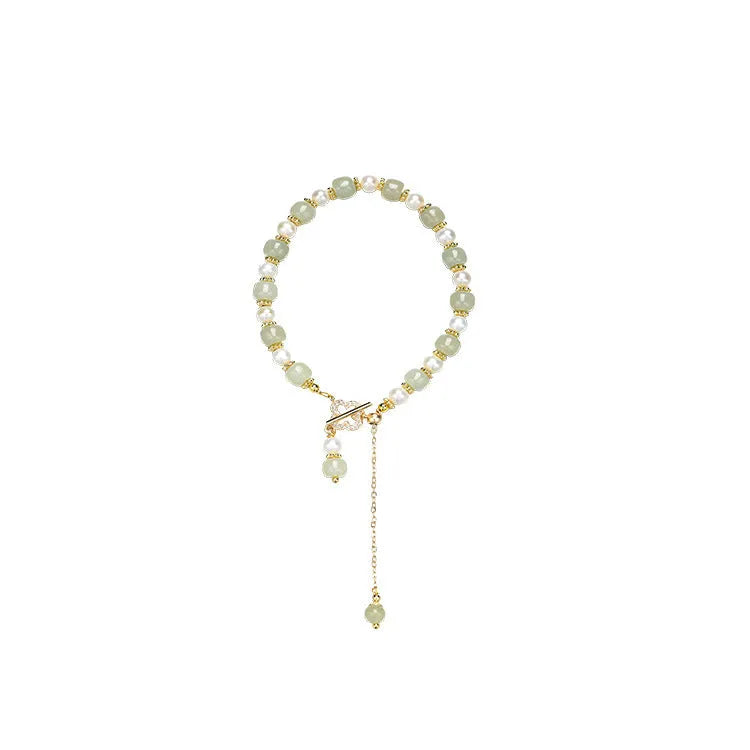 Women's Hetian jade bracelet with round pearl pendant and gold electroplated metal links