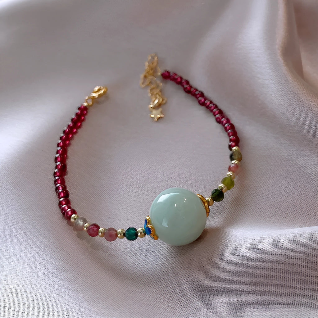 Garnet-coloured tourmaline drop bracelet in electroplated setting for women.