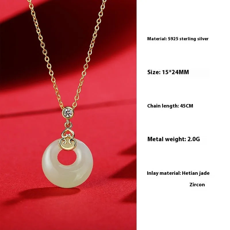 Chinese style sterling silver jewellery set showing gourd bracelet, Fu character necklace, and earrings with Hetian jade inlay.
