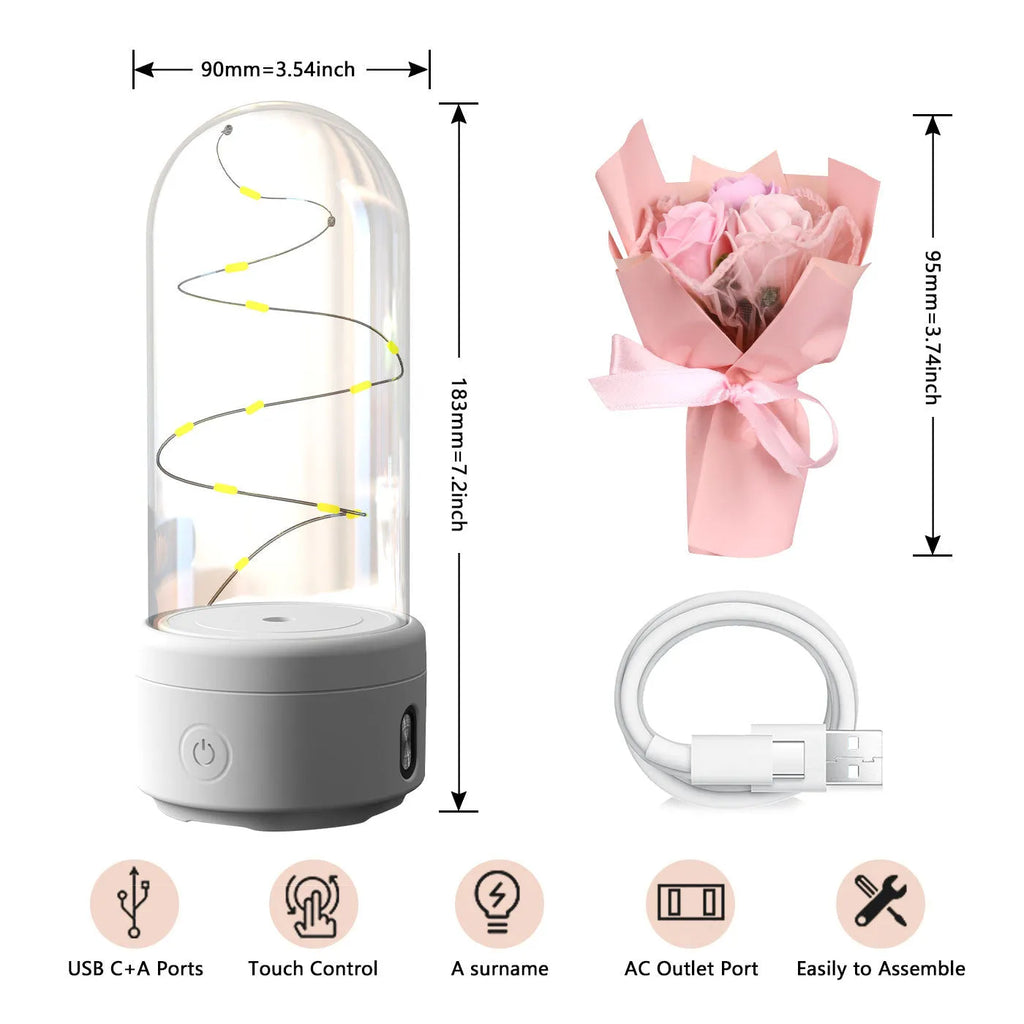 Glass-covered rose ornament with built-in LED light and Bluetooth speaker on black or white base