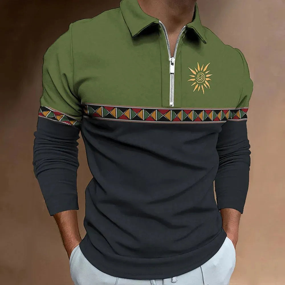 Man wearing a loose-fit, long-sleeve t-shirt with retro striped colour printing and a decorative zip detail.