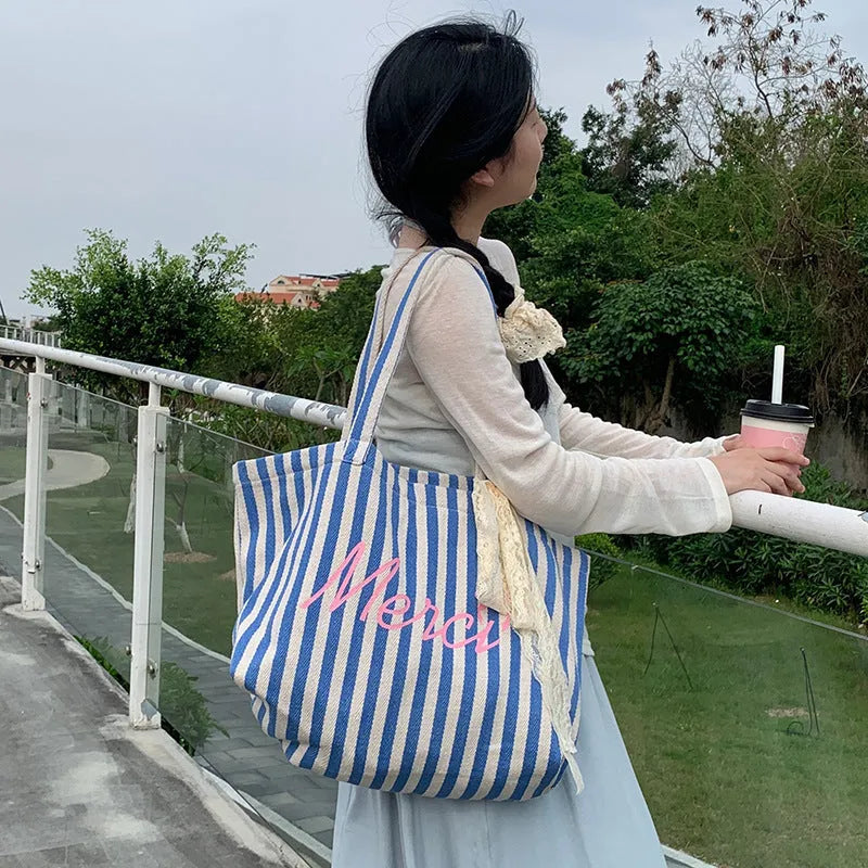 Blue striped letters printed cotton canvas shoulder bag with pink blue white stripes