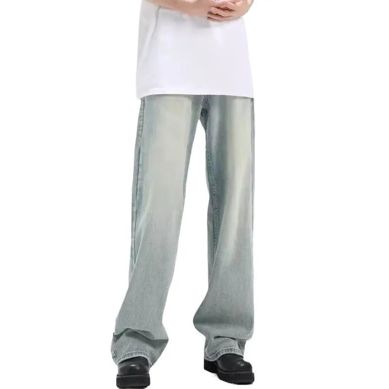 Blue men's loose casual trousers with a retro style and elasticated waistband.