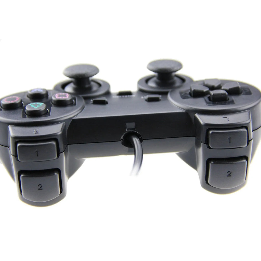 PS2 wired USB game controller with vibration feedback in neutral bare metal finish