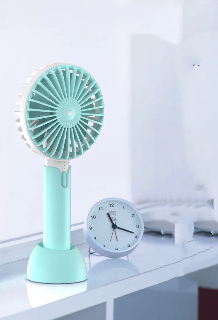 Blue handheld mini USB electric fan with three-speed control and oscillating head