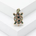 Retro style turtle brooch with rhinestone detailing in blue, green, or red colour options