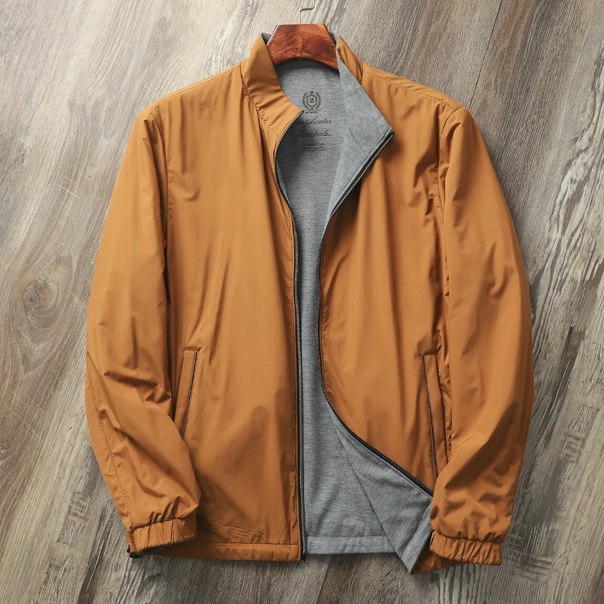 Men's simple stand collar casual jacket in a polyester blend fabric, shown in one of four available colours.