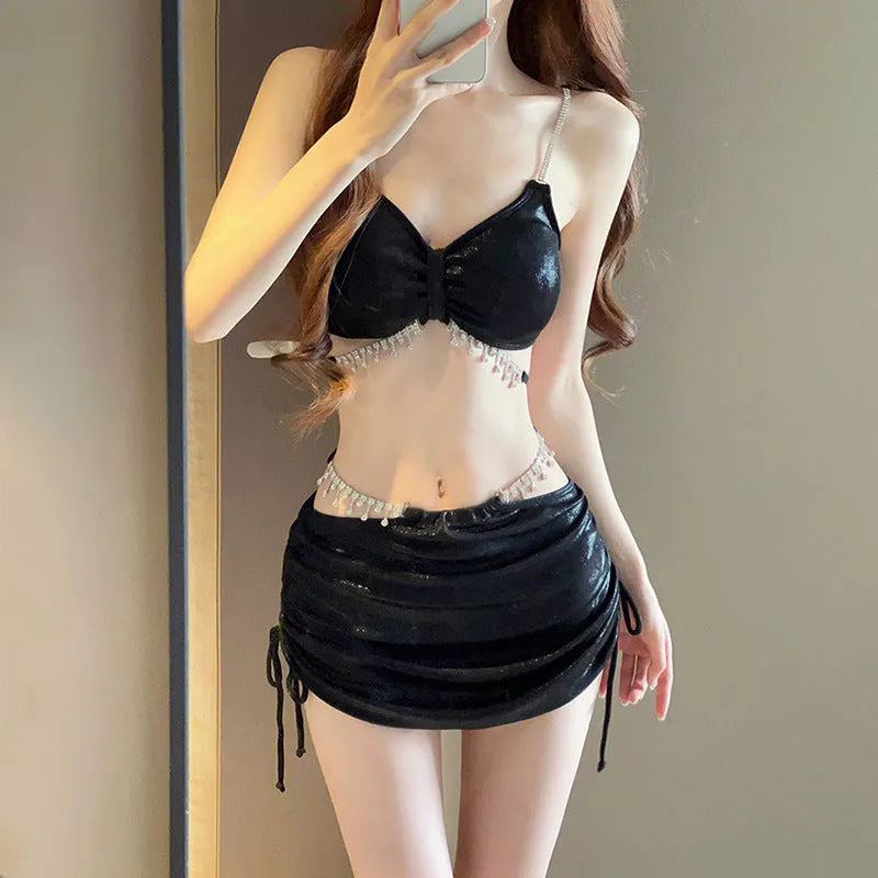 Women's black or pink solid colour polyester bikini swimsuit set for swimming.