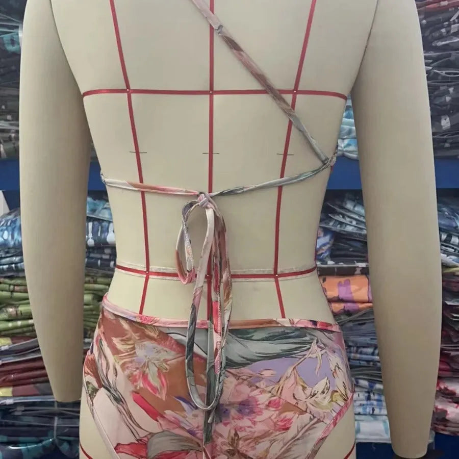 Women's rose gold pattern swimsuit made from polyester fabric available in multiple sizes